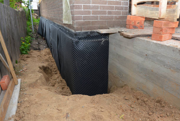 SJ Waterproofing Pros technician performing targeted Sump Pump Installation assessment in Washougal, WA